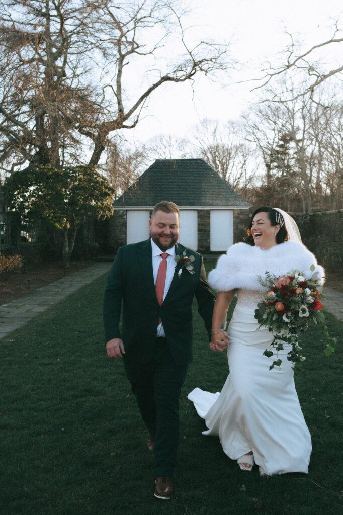 Couple walking in one of the gardens of Shepherd's Run - a nontraditional wedding venue in Rhode Island. Photo by Rhode Tripper Photography