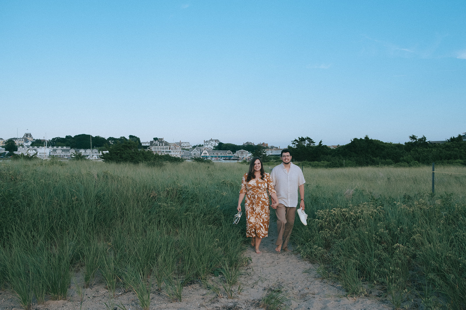 Couple on the beach in Westerly, RI. Photo by Rhode Tripper Photography.