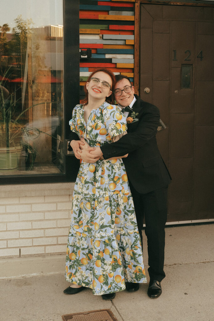 Boston restaurant wedding at La Brasa. Queer couple getting married. Photo by Rhode Tripper Photography