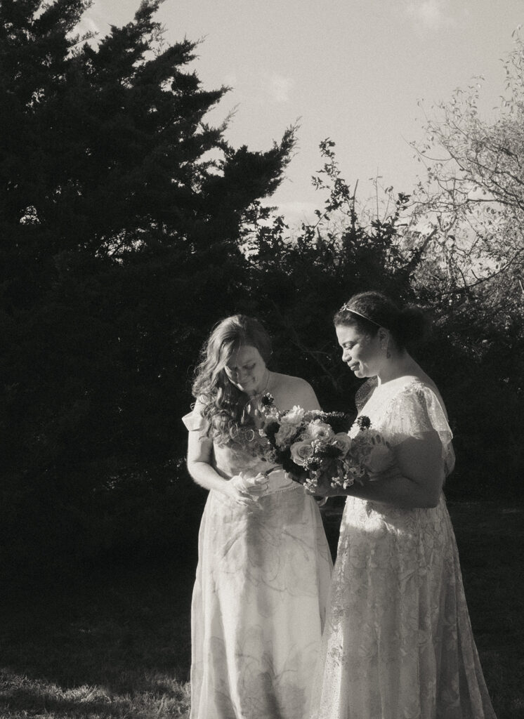 Black and white photo of the bride and her mom having an emotional moment together before the wedding ceremony. Photo by Rhode Tripper Photography