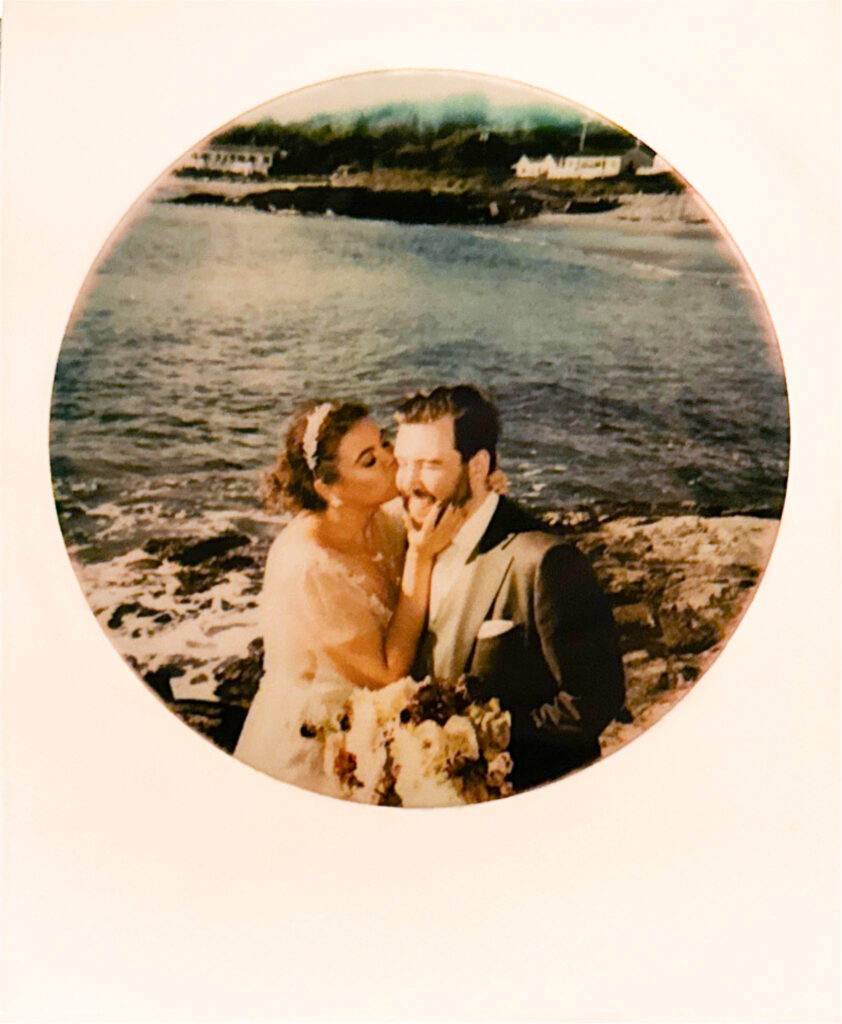 Polaroid scan of bride and groom on the rocks at Castle Hill Inn's private beach. Photo by Rhode Tripper Photography