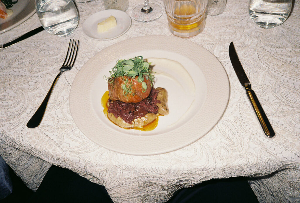 Steak dinner at Castle Hill Inn wedding. Photo by Rhode Tripper Photography