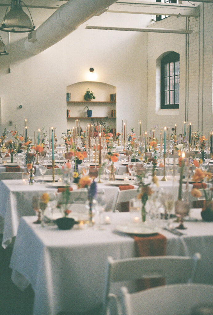 Reception setup after ceremony room flip at spring wedding venue in Providence. Photo by Rhode Tripper Photography