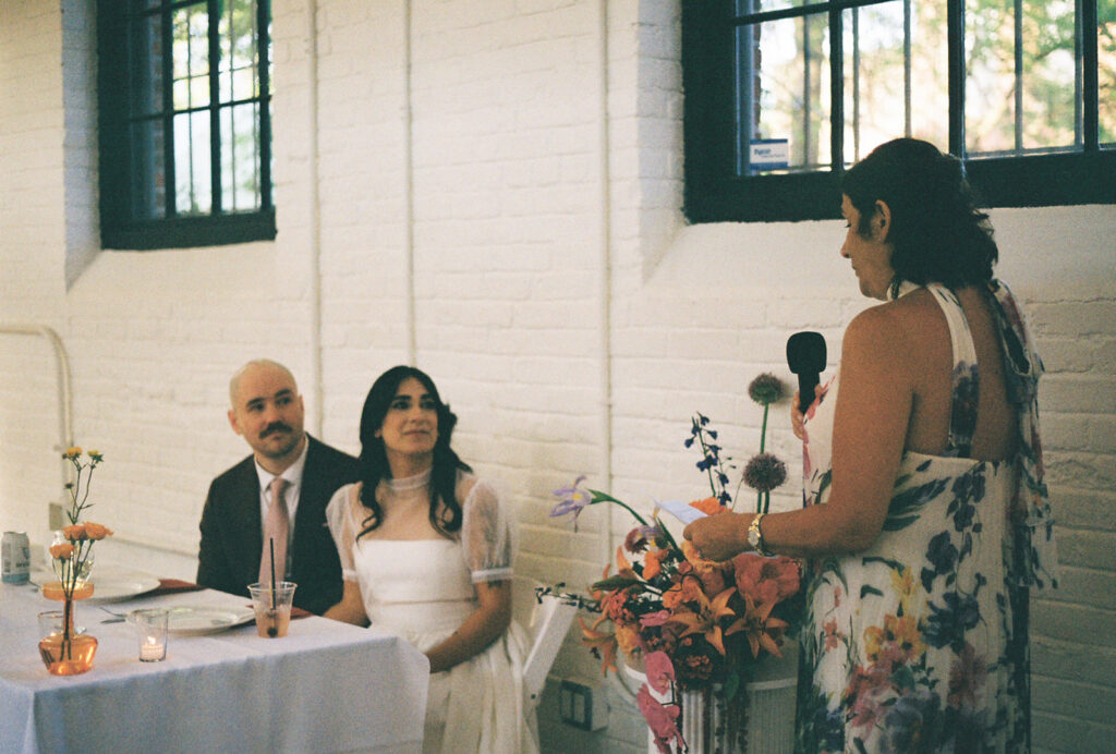 Family giving toasts at spring wedding reception in Providence. Photo by Rhode Tripper Photography