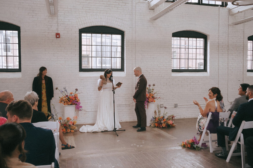 Groom's teddy bear making special appearance during ceremony at boutique hotel. Photo by Rhode Tripper Photography