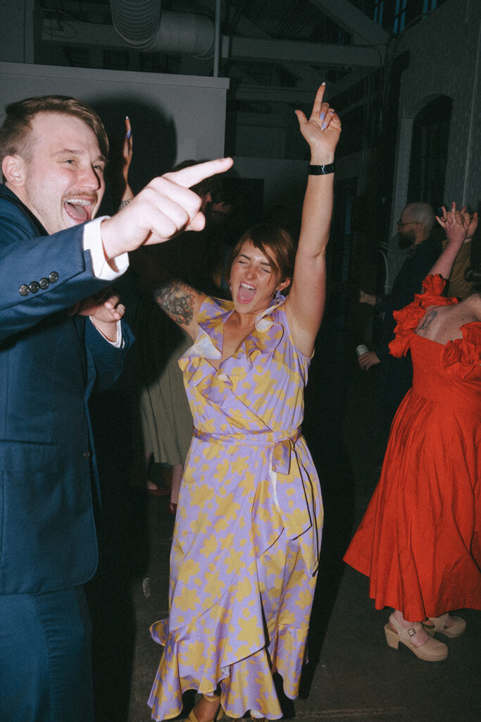 Guests dancing to live band at boutique hotel reception in Providence. Photo by Rhode Tripper Photography